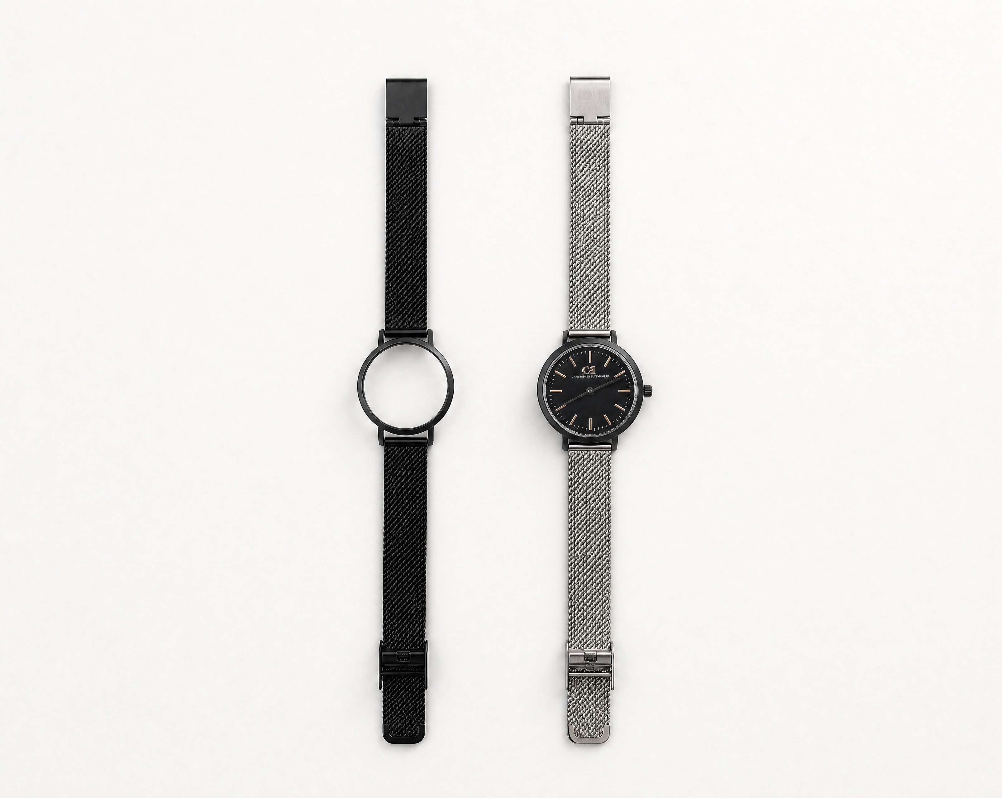 Aureum Swiss Made modular watch — round black case with black mesh strap and round silver case with black dial and silver mesh strap