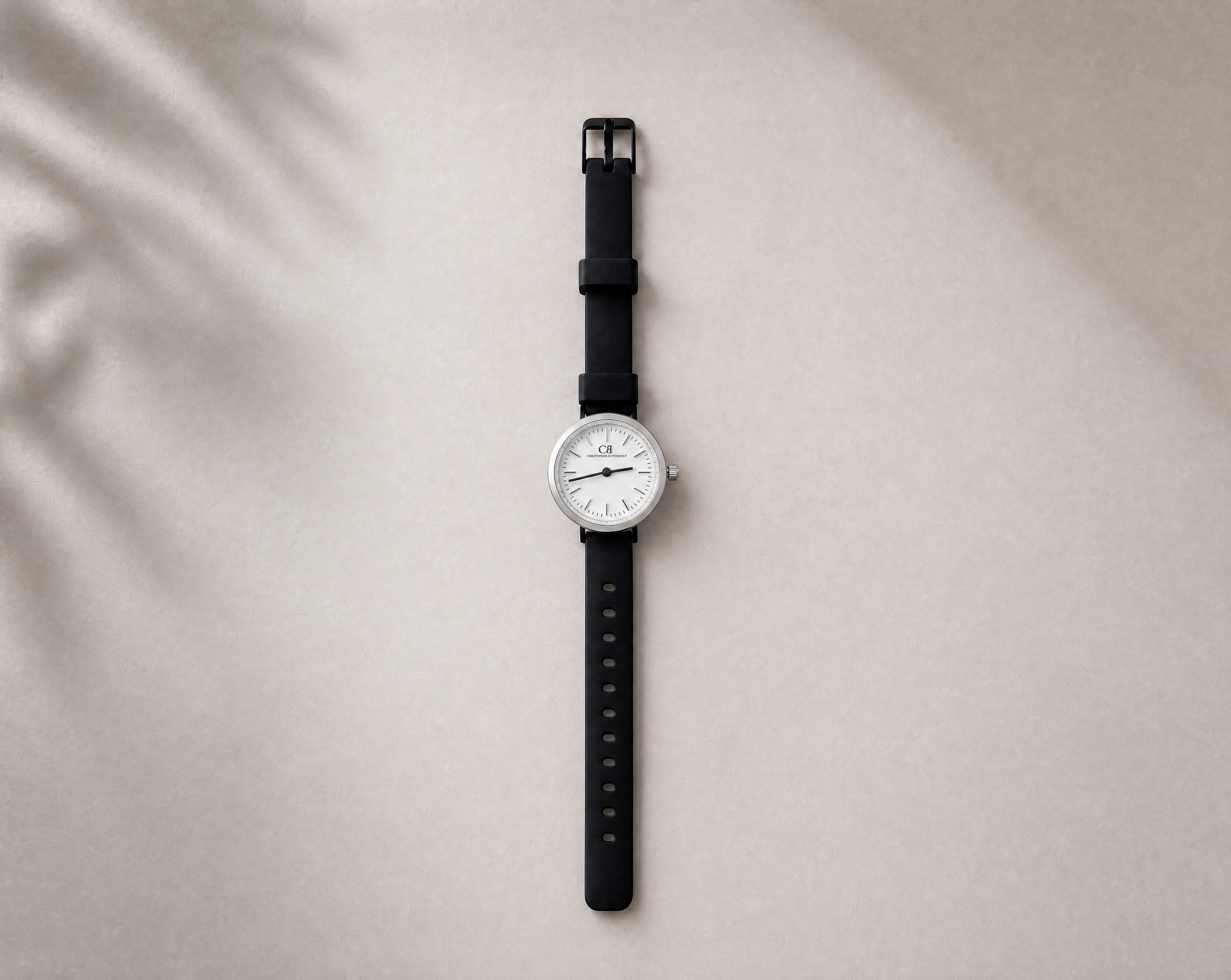 Certamen Swiss Made modular women's sport watch — round silver case with white dial and black PVC strap, close-up product view