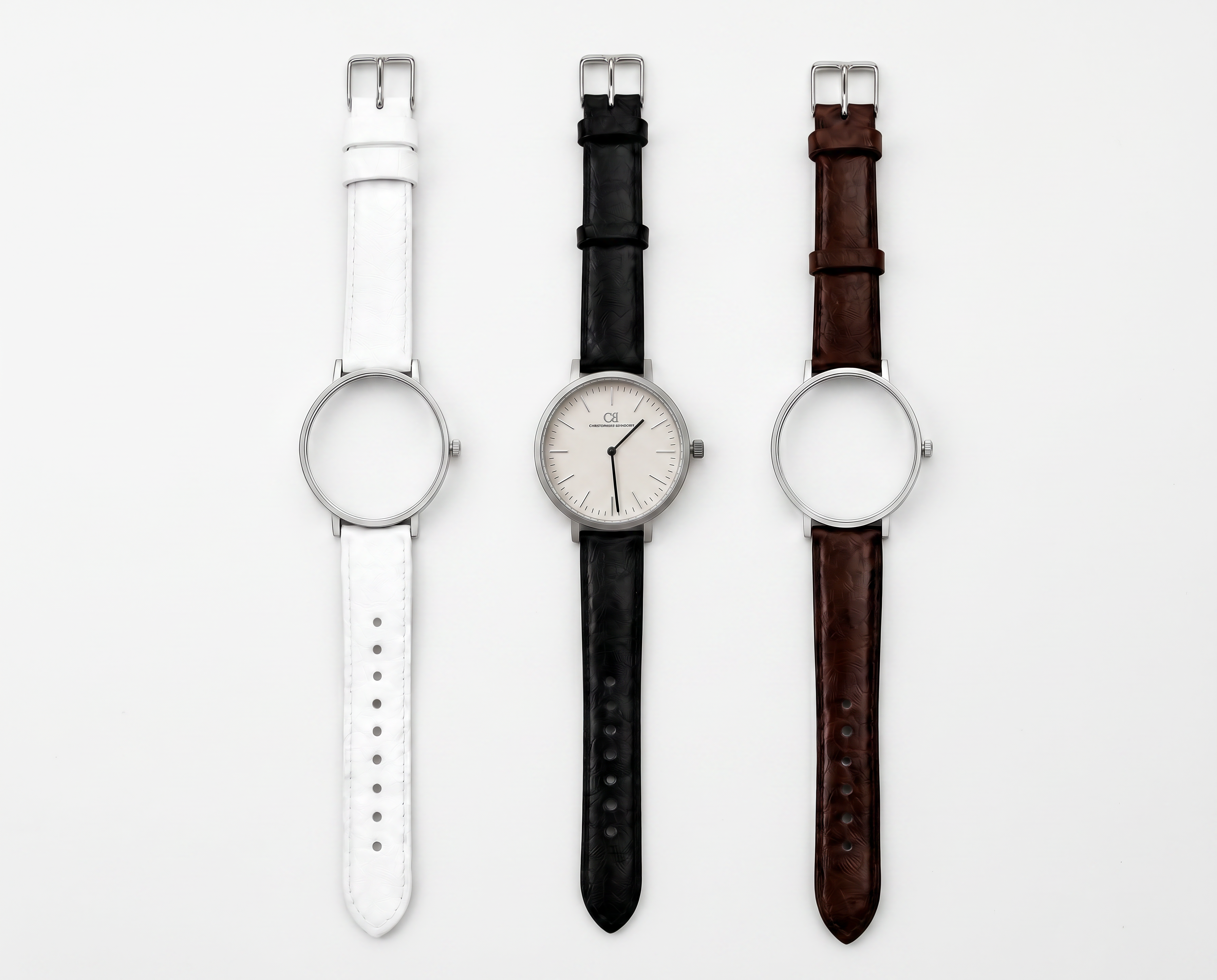 Elegans Swiss Made modular watch — round silver case with interchangeable white, black and brown leather straps