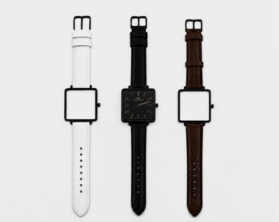 Elegans Swiss Made modular watch — square black case with interchangeable white, black and brown leather straps