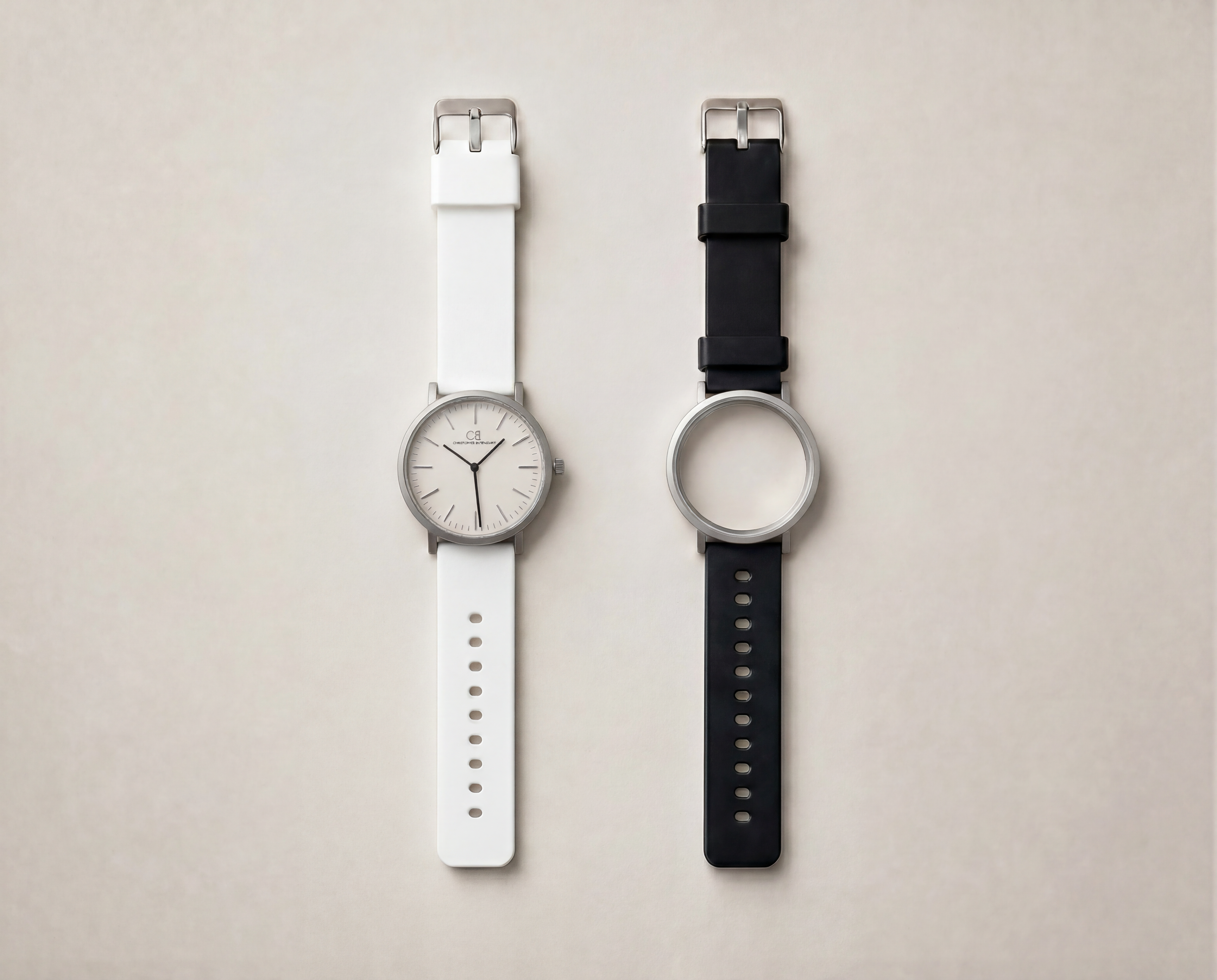 Ludus Swiss Made modular watch — round silver case with white and black interchangeable sport PVC straps