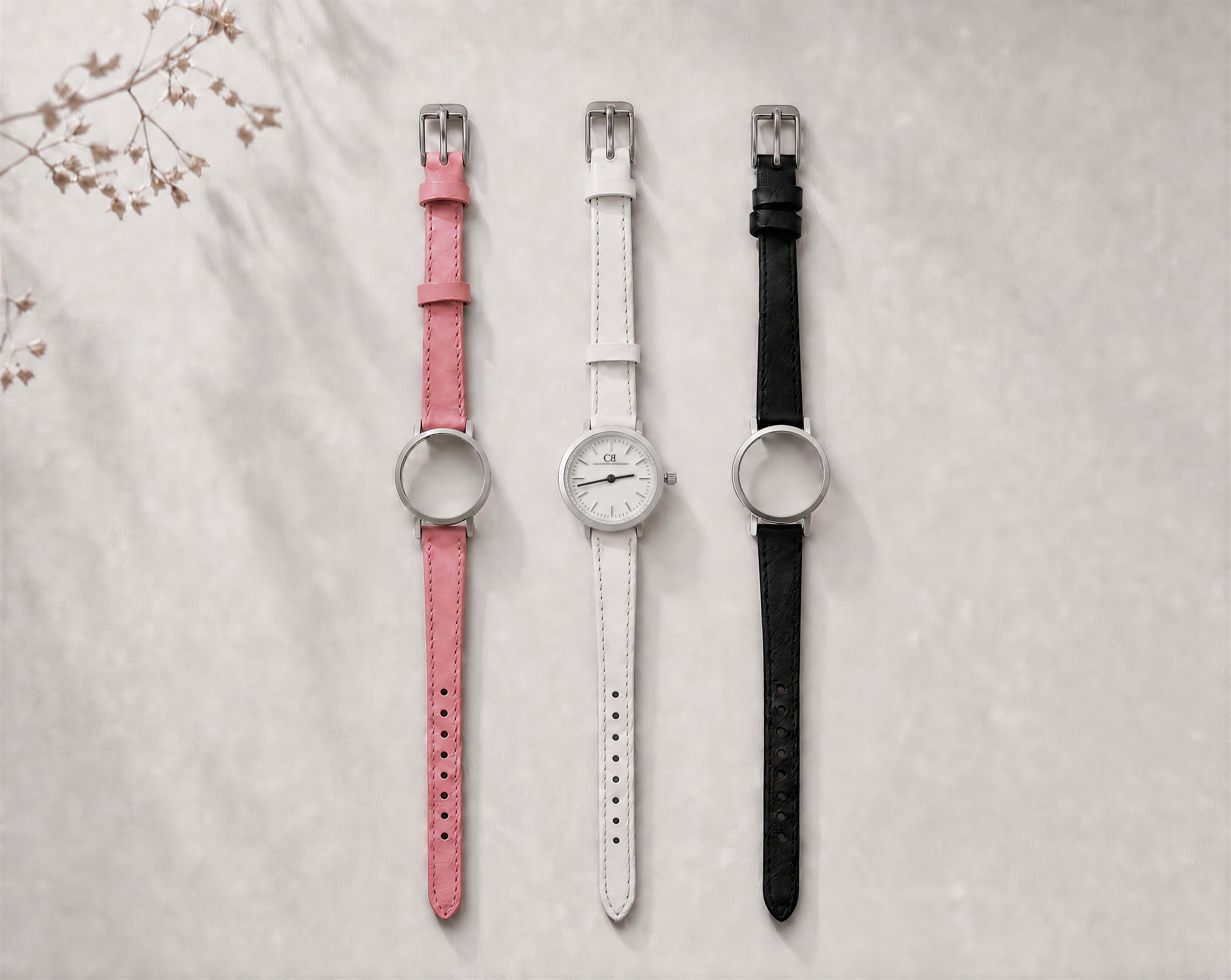 Venustus Swiss Made modular women's watch — round silver case with white dial, shown with interchangeable pink, white and black leather straps